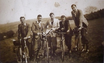 vintage people on bicycles