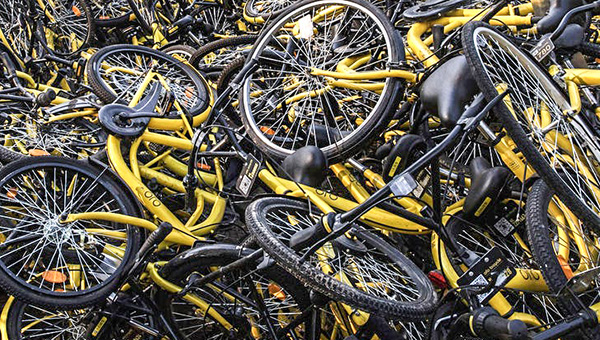 a pile of bicycles